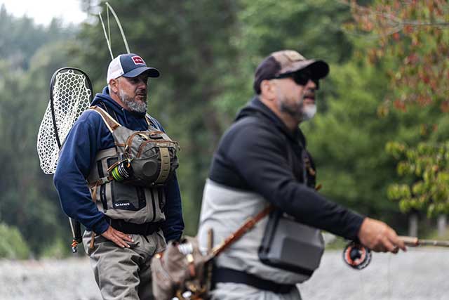 Kyle coaching a student on casting - fly fishing - Pacific Rover